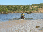Motorbike crossing the Pentecost River